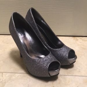 Silver heel pumps